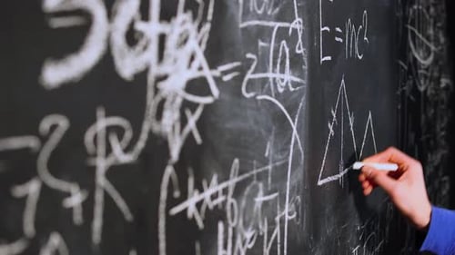 Hand Writing Trigonometry Equations on a Chalkboard