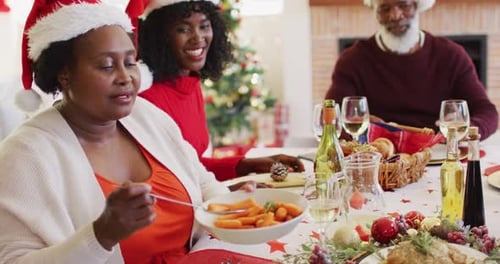 Family Celebrates Christmas at the Dining Table