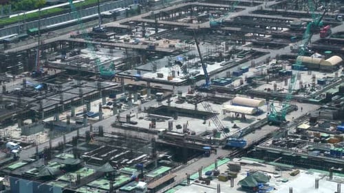 Large Construction Site with Heavy Construction Machinery in Metropolis