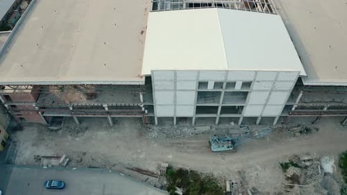 Aerial Drone View. Huge Workshop Buildings of Future Production Plant at Industrial Complex