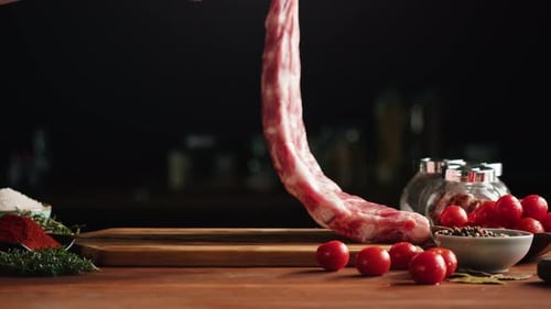 Woman Chef Cooking Ribs Closeup
