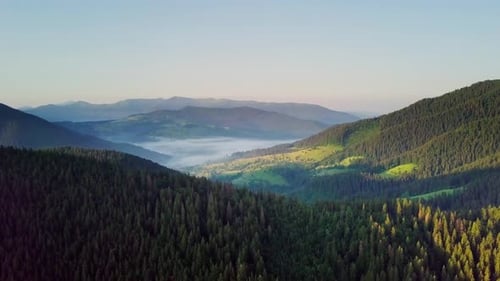 Mountain Peaks and Morning Sky with Smooth Moving Clouds