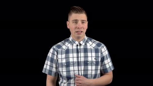 A Young Man Shows an Emotion of Fear on His Face, A Person Experiences Fear, A Man in a Shirt
