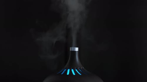 Aromatherapy Diffuser Releasing Steam and Color