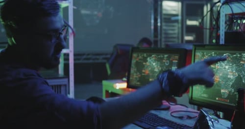 Cybersecurity Team Working Late in Dark Room