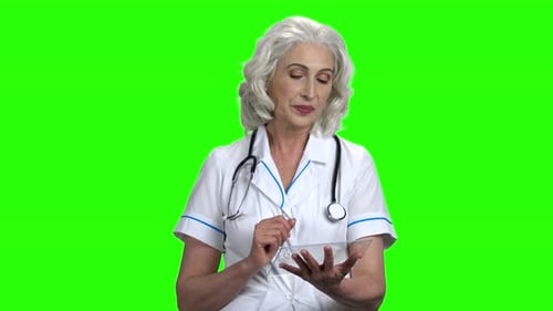 Female Doctor Using Futuristic Digital Tablet