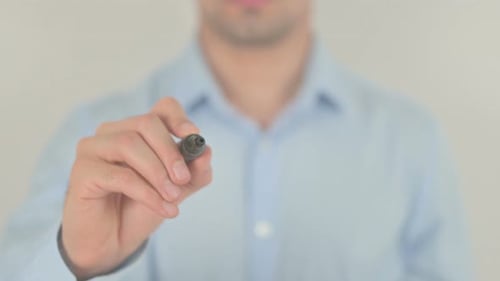 Writing the Word 'System' on Glass Board