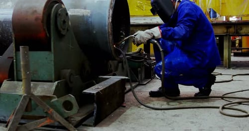 Male Engineer Using Welding Torch