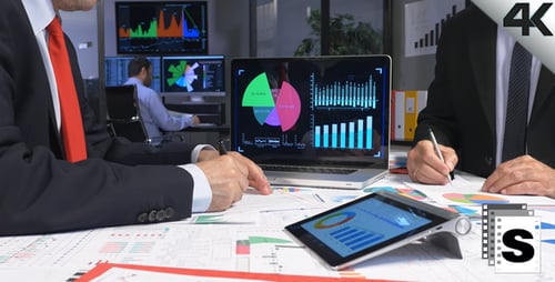 Financial Analysis and Data Review in Modern Office