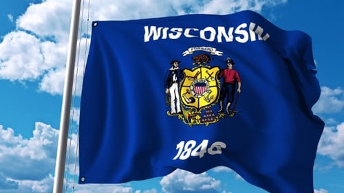 Waving Wisconsin State Flag Against Blue Sky Background