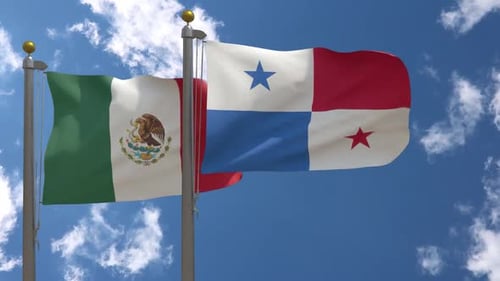 Mexico and Panama Flags Waving in Wind Against Blue Sky