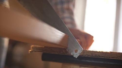 The Carpenter Sweeps the Shavings Off the Wood with Wood.