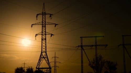 Electrical Pylons Against a Stunning Sunset