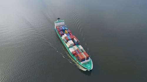 Aerial View of Container Ship Sailing in Sea