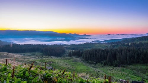 Majestic Mountain Landscape with Sunrise and Fog