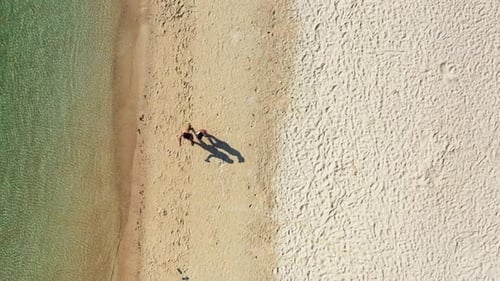 Women relaxing on tranquil sea view beach time by transparent lagoon with white sand background of K