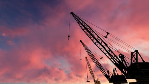 Building Construction and Sunset Sky