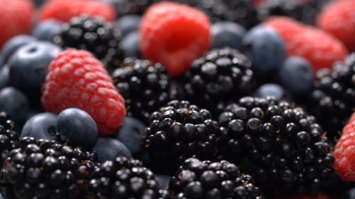Close Up of Fresh Raspberries Blackberries and Blueberries