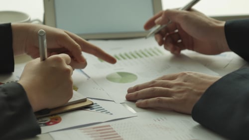 Business Team Analyze Financial Data Together