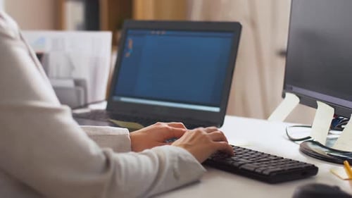 Programmer Typing on Computer Keyboard at Office 14