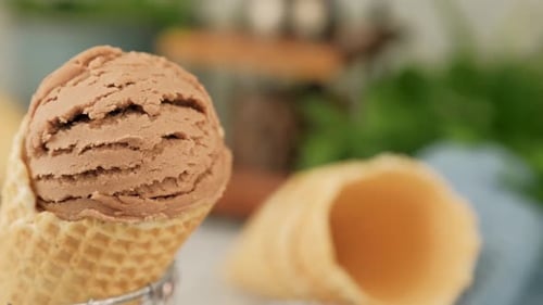 Chocolate Ice Cream in Waffle Cone Close-Up