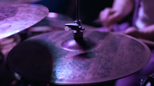Drummer Plays Cymbals at a Concert