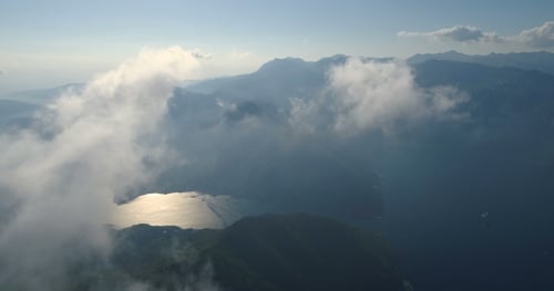 Aerial View of Mountains and Ocean Landscape