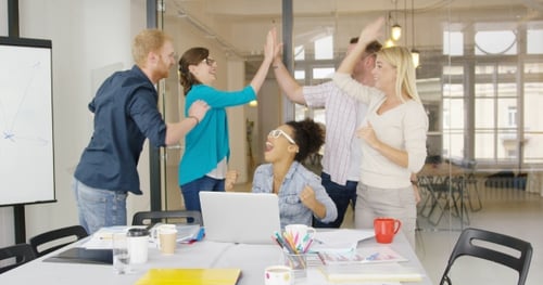 Workers Giving High Five