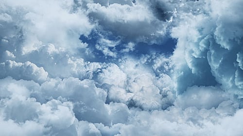 Dynamic Moving Clouds Background With Blue Sky Glimpses
