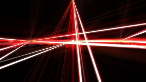 Laser Show From Multi-colored Rays of Light in Dark in Disco