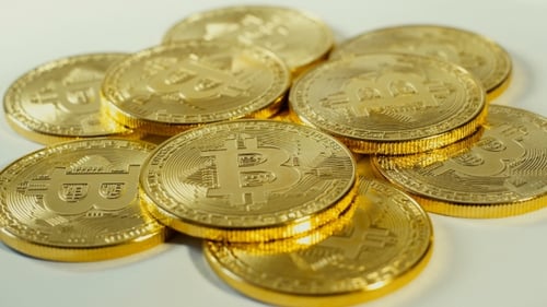 Gold Bitcoin Cryptocurrency Coins Piled Close Up
