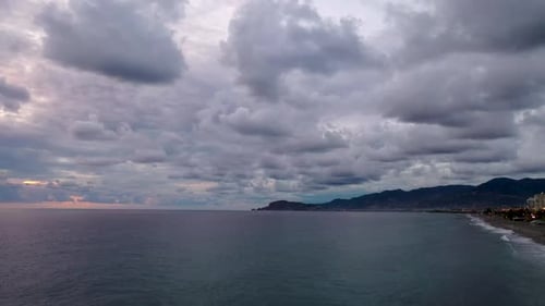 Cloudy Sunset Over the Sea Aerial View 4 K