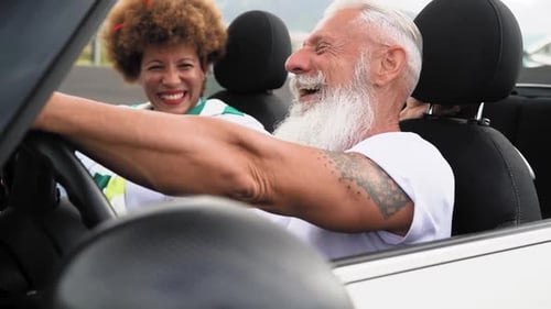 Senior Couple Enjoying a Fun Convertible Ride