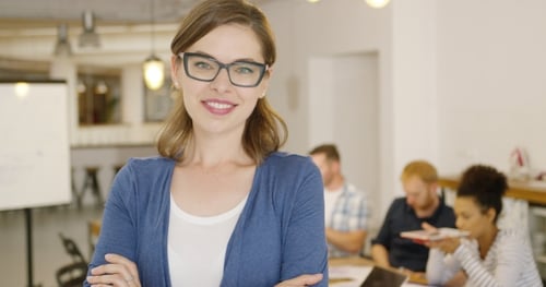 Young Female Worker Posing in Office
