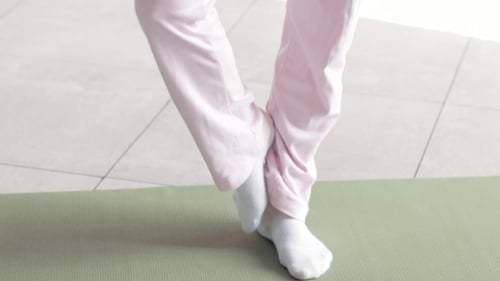 Shooting Exercises Yoga . Sporty Girl Doing Exercises on Mate. Magnificent Stretching and Stability