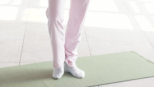 Shooting Exercises Yoga . Sporty Girl Doing Exercises on Mate. Magnificent Stretching and Stability