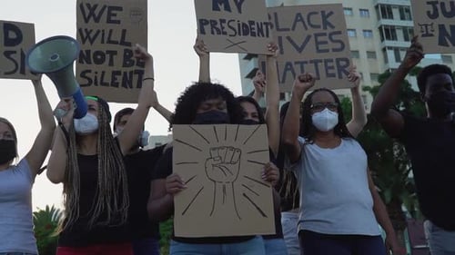 Group Protests Holding "Black Lives Matter" Signs