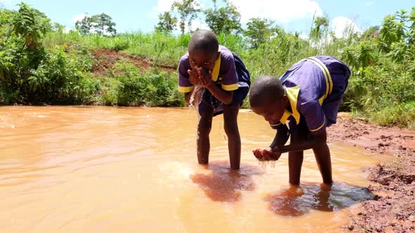 Children Drinking Muddy Water, People Stock Footage ft. poor children ...