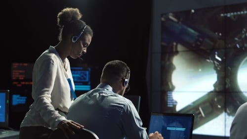 Scientists in Flight Control Center