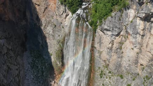 Drone Flight Of Waterfall Over Cliff