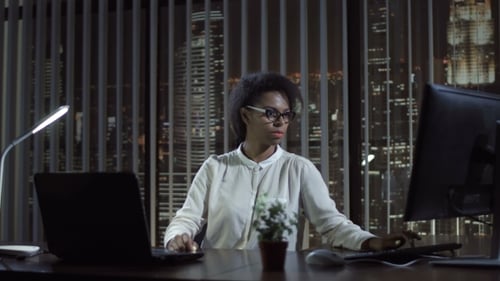 Black Woman Working in Office