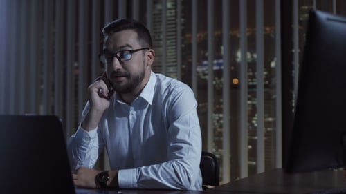 Office Employee Talking Phone