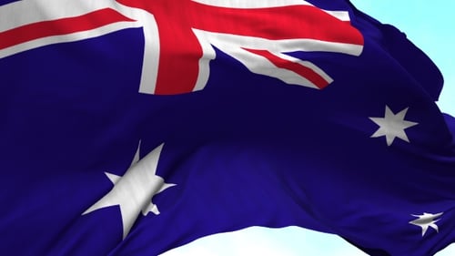 Realistic Australian Flag Waving Against Blue Sky