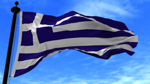 Realistic Greek Flag Waving in the Wind Against Blue Sky