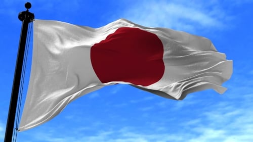 Realistic Japanese Flag Waving Seamlessly in Blue Sky