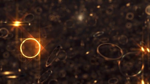 Shimmering Golden Rings Abstract Particle Background