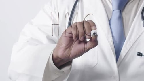 Doctor Writes HMO Acronym on Glass