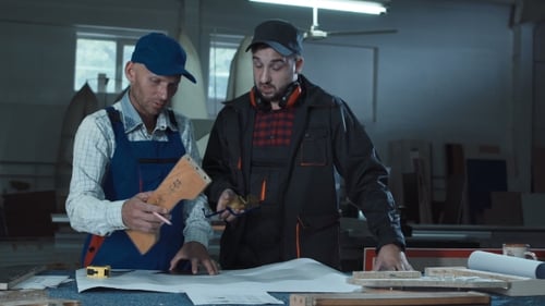 Workmen Measuring Detail in Joinery