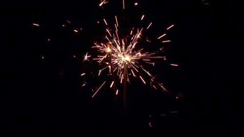 Sparklers Shimmering and Sparking in the Darkness