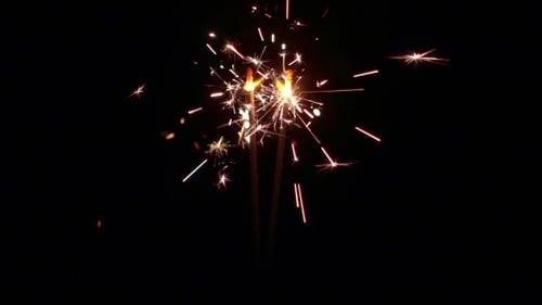 Sparkling Sparklers Burning Brightly in the Dark